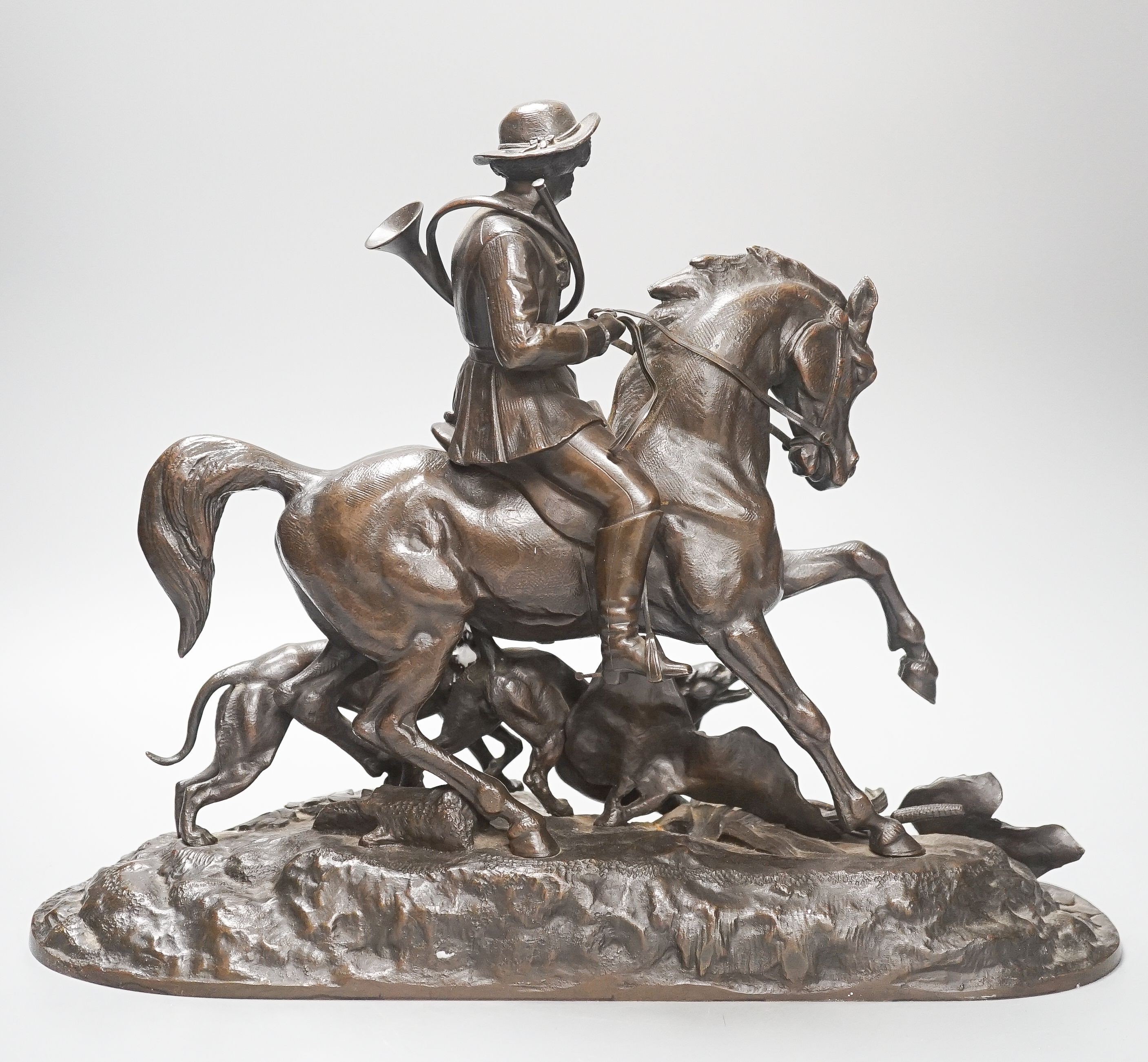 A 19th century bronze horse group of a hunter 32cm